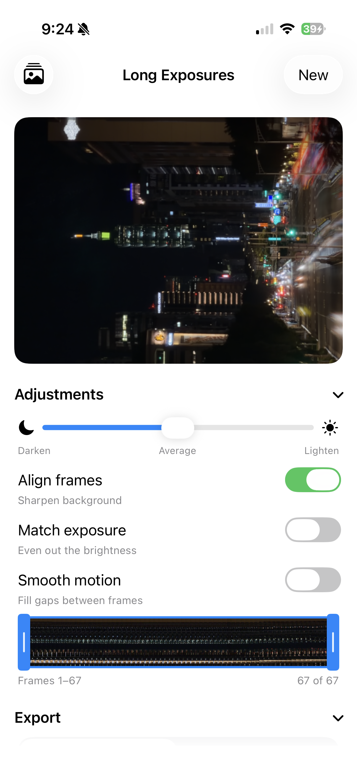 Long Exposures editor with Align frames on — the same night street is sharp, with clean light trails from the cars